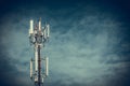 Mobile phone communication antenna tower with the blue sky and c Royalty Free Stock Photo