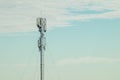 Mobile phone communication antenna tower with the blue sky and clouds, Telecommunication tower Royalty Free Stock Photo