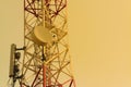 Mobile phone communication antenna tower with satellite dish on Royalty Free Stock Photo