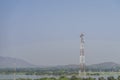 Mobile phone communication tower transmission signal with blue sky background Royalty Free Stock Photo