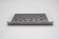 Mobile phone with drops on oleophobic screen. Royalty Free Stock Photo