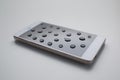 Mobile phone with drops on oleophobic screen. Royalty Free Stock Photo