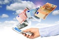Mobile phone and euro money. Royalty Free Stock Photo