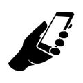 Mobile phone in hand icon. Vector Royalty Free Stock Photo