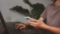 Mobile phone In the hands of a young woman, artificial intelligence technology symbol icon