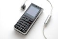 Mobile phone and the headphone Royalty Free Stock Photo
