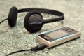 Mobile phone with headphones Royalty Free Stock Photo