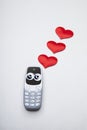 Mobile phone heart leather background