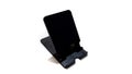 Mobile Phone Holder Stand Can Foldable and Adjustable for Multiple Angles Isolated on White Background Royalty Free Stock Photo