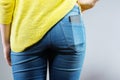 Mobile phone in jeans pocket Royalty Free Stock Photo