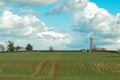 Mobile phone mast to transmit to networks in a rural field