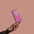 Mobile Phone Mockup Image. Screen as Empty. Hand levitating a Blank Display Smartphone. Clean and Minimal
