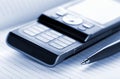 Mobile phone and pen Royalty Free Stock Photo