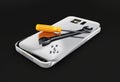 Mobile phone repair, Broken mobile phone with screwdriver and spanner. 3D illustration, isolated black