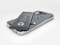 Mobile phone repair, 3D illustration. Broken mobile phone with battery. Repair electronic equipment