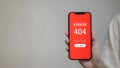 Mobile Phone Showing 404 Error Page Not Found on Red Screen Royalty Free Stock Photo