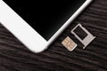 Mobile phone and sim card Royalty Free Stock Photo