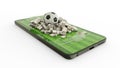 Mobile phone Soccer betting. Football and Nigeria Naira notes on phone screen. Soccer field on smartphone screen