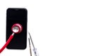 Mobile phone with stethoscope, electronics repair concept Royalty Free Stock Photo