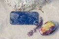 Mobile phone submerged in the water Royalty Free Stock Photo