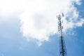 Mobile phone transmitter pole on blue sky and clouds Royalty Free Stock Photo