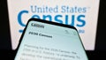 Mobile phone with webpage of US agency United States Census Bureau (USCB) on screen in front of logo. Royalty Free Stock Photo