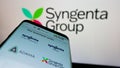 Mobile phone with website of Swiss agriculture company Syngenta Group on screen in front of business logo. Royalty Free Stock Photo