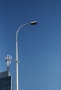 Mobile phones system antennas and street lamp Royalty Free Stock Photo