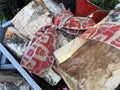 Birch firewood folklor tied with bow on a background of Christmas attributes.