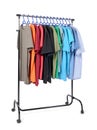 Mobile rack with clothes on white background Royalty Free Stock Photo