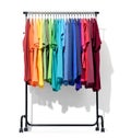 Mobile rack with color clothes on white background. File contains a path to isolation Royalty Free Stock Photo