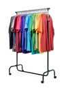 Mobile rack with color clothes on white background. File contains a path to isolation. Royalty Free Stock Photo