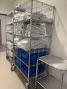 A mobile rack with hospital linen