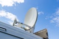 The mobile satellite dish is mounted on the car. Royalty Free Stock Photo