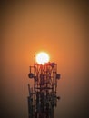 Mobile signal tower at the time of sun set Royalty Free Stock Photo