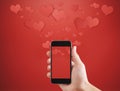 Mobile smart phone, with floating hearts. Valentines, love message and texting concept