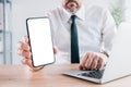 Mobile smart phone mock up screen, businessman holding cellular phone with blank white display Royalty Free Stock Photo