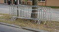 Mobile steel fence. Police security road barrier.