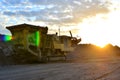 Mobile Stone crusher machine by the construction site or mining quarry for crushing old concrete slabs into gravel Royalty Free Stock Photo