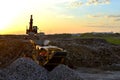 Mobile Stone crusher machine by the construction site or mining quarry for crushing old concrete slabs into gravel Royalty Free Stock Photo