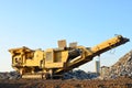 Mobile Stone crusher machine by the construction site or mining quarry for crushing