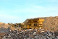 Mobile Stone crusher machine by the construction site or mining quarry for crushing old concrete slabs into gravel and subsequent Royalty Free Stock Photo