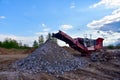 Mobile Stone Jaw crusher machine for crushing concrete into gravel and subsequent cement production. Salvaging and recycling of Royalty Free Stock Photo