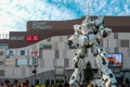 Mobile Suit Gundam Unicorn standing in front of the Diver City Tokyo Plaza building, Japan landmark and popular for tourist attrac