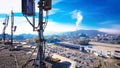 Mobile telecommunication cellular radio network antennas on a mast on the roof Royalty Free Stock Photo