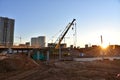 Mobile telescopic boom crane on bridge construction. Truck Crane work on building bridges. Road work on traffic highway, road Royalty Free Stock Photo