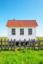 Mobile Tiny Home on Wheels, Ready for Adventure A small, self contained house on wheels, parked in a scenic natural setting. Focus Royalty Free Stock Photo