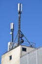 Mobile transmission masts on the roof of a house