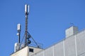 Mobile transmission masts on the roof of a house