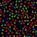 Seamless alphabet pattern on a black background Royalty Free Stock Photo